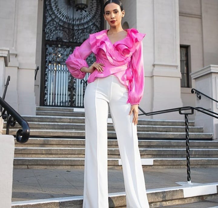 BLUSA ROSADO DE VUELOS