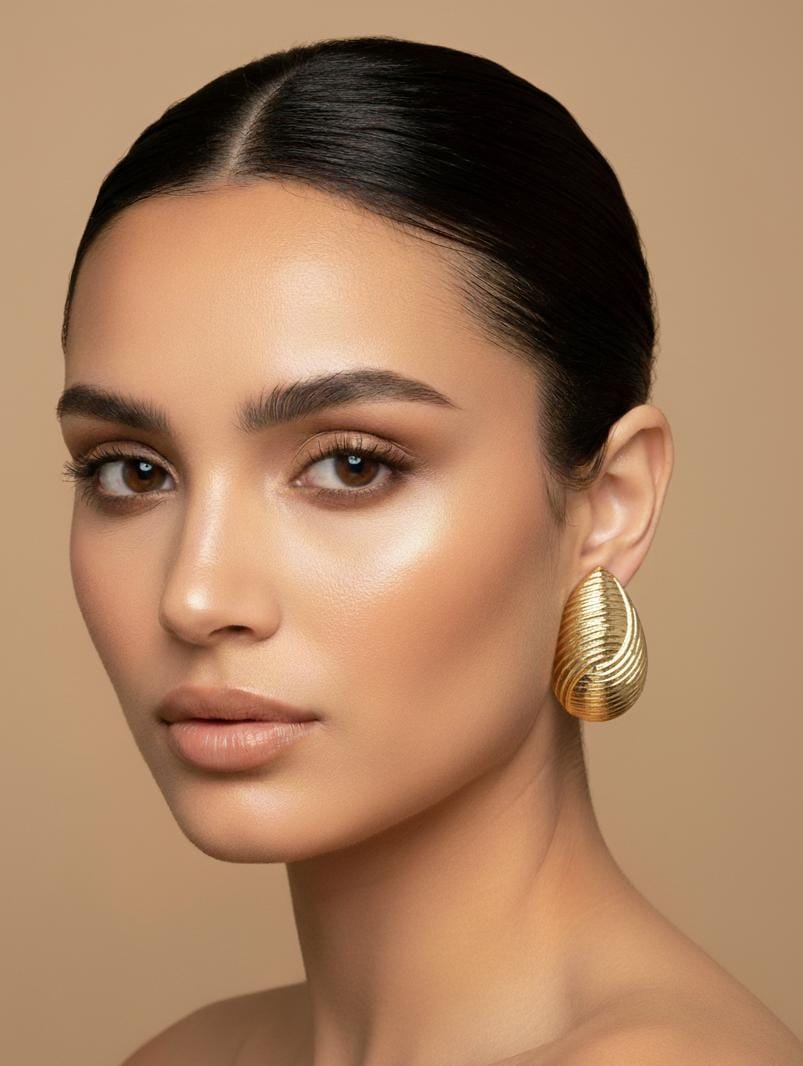 ARETES DORADO DISEÑO ONDULADO